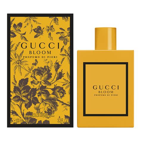 gucci bloom perfume yellow bottle.